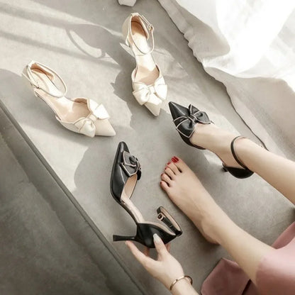 Women's heeled shoes with pointed toe, bow, ankle strap, medium heel