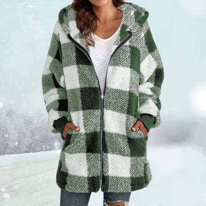 Damen Winterjacke mit grün-weißem Karomuster, Kapuze und Reißverschluss. Modische, warme Jacke für kalte Tage. Ideal für Wintermode.