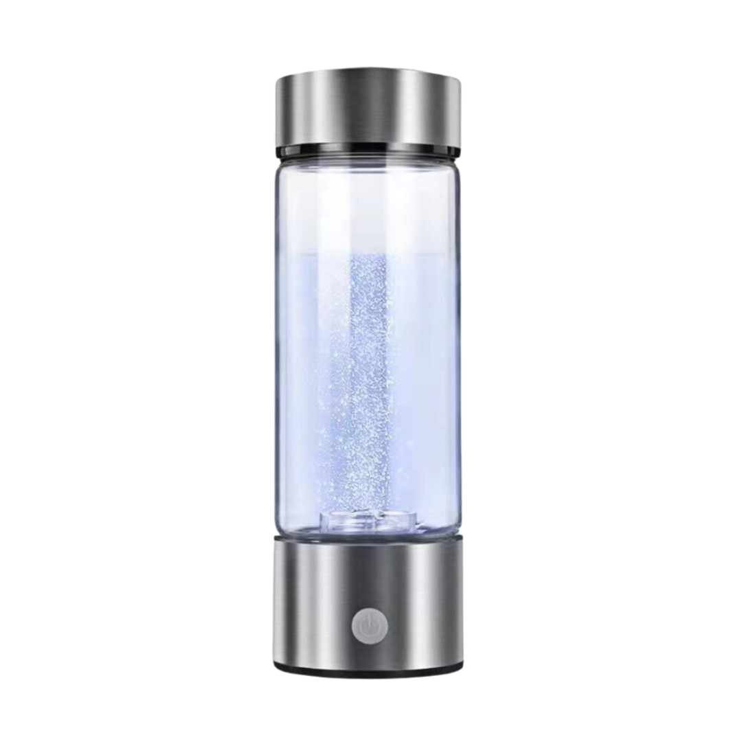 Kompakter Wasserstoff-Wasser-Generator mit Edelstahl-Design, transparentem Glasbehälter und LED-Anzeige. Ideal für gesundheitsbewusste Nutzer.