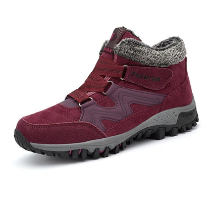 Bordeauxfarbener Damen-Wanderschuh mit Kunstfellfutter, rutschfester Sohle und Klettverschluss. Ideal für Outdoor-Aktivitäten im Winter.