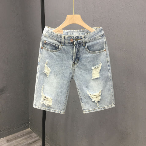 Men's denim shorts with a used look and rips, mid-rise waistband