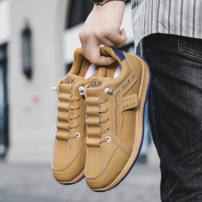 Men's skate shoes with laces, flat sole, and rounded toe cap