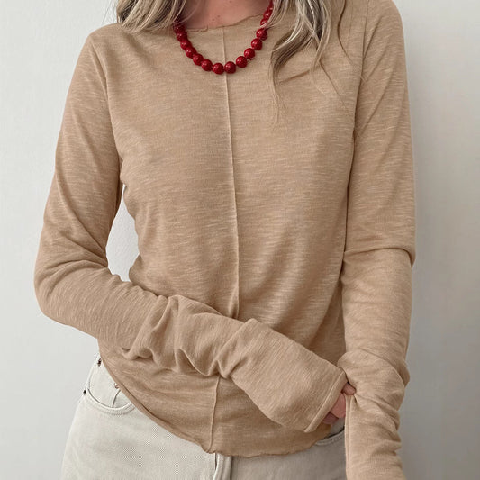 Women's long-sleeve shirt with round neckline and pleat detail