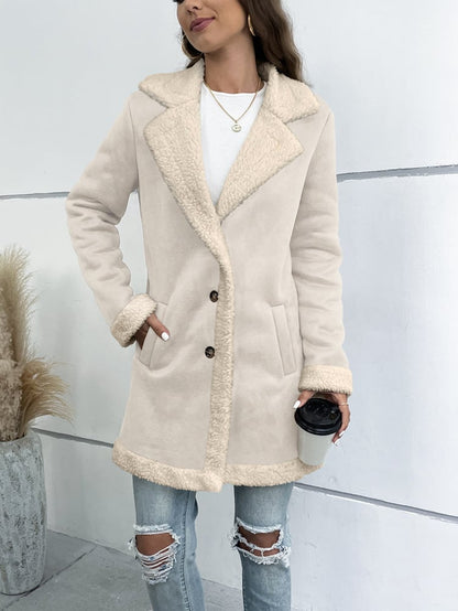 Women's long winter coat with lapel collar and solid suede look