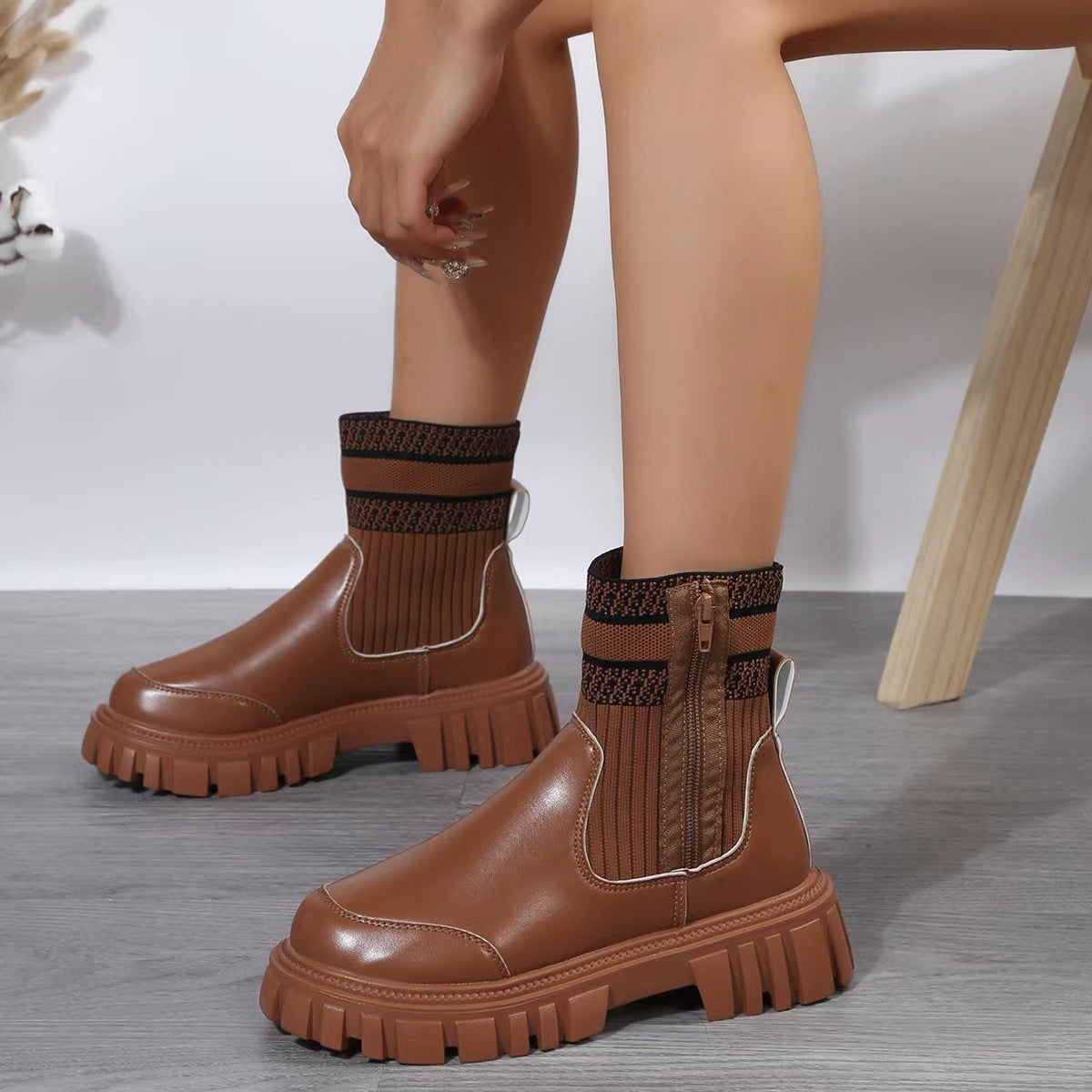 Women's winter boots with mid-calf shaft and side zipper