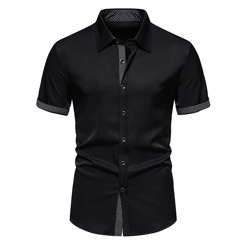 Schwarzes Herrenhemd mit kurzen Ärmeln, Knopfleiste und kontrastierenden Akzenten. Elegantes Design, ideal für formelle und lässige Anlässe.