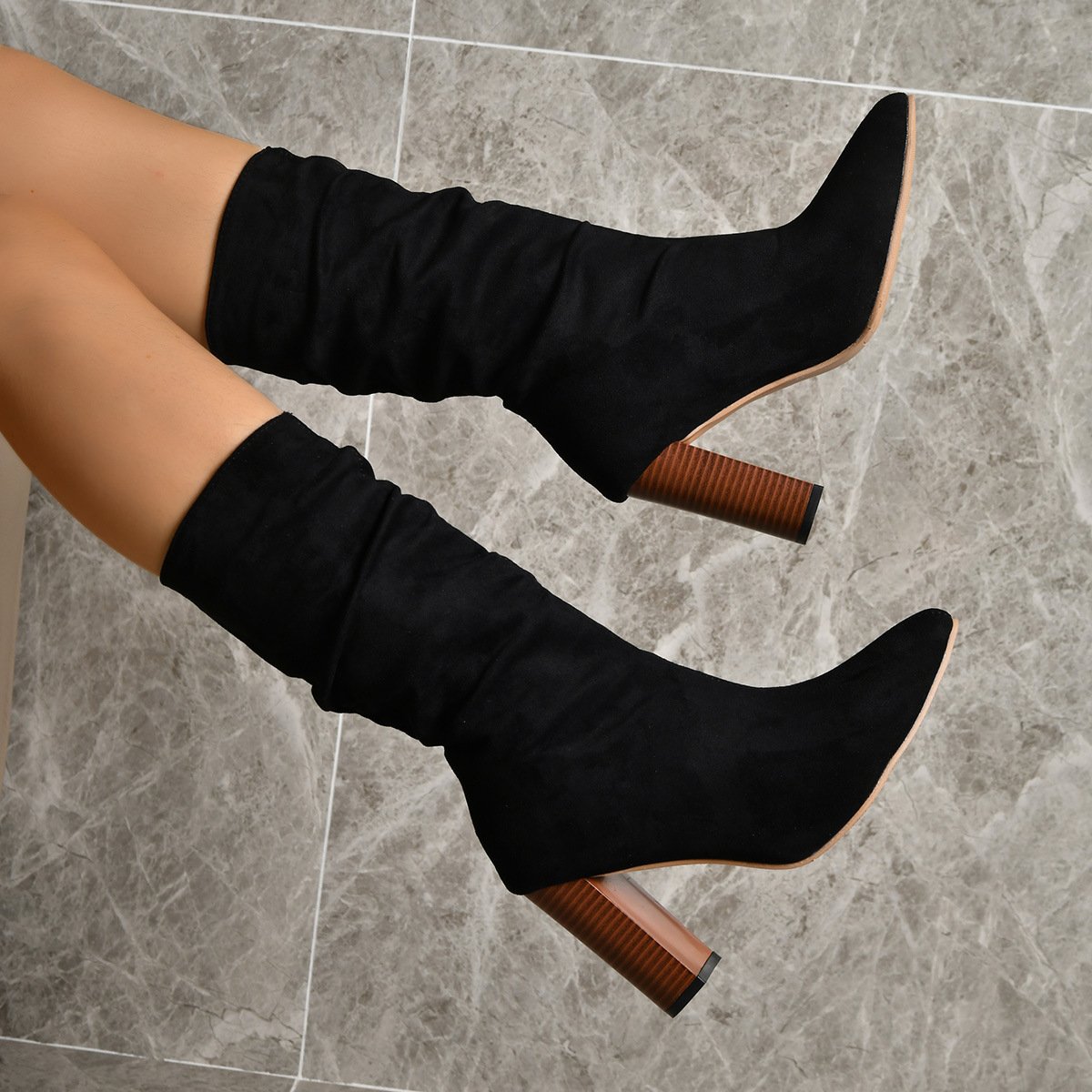 Women's winter boots in mid-calf length with pointed toe and high block heel