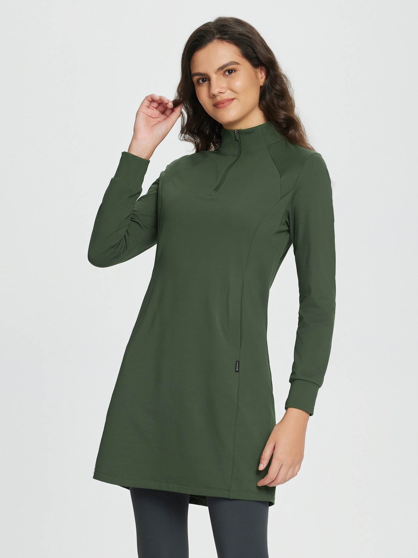 Women's winter dress with zipper stand-up collar, side pockets, and slitted hem