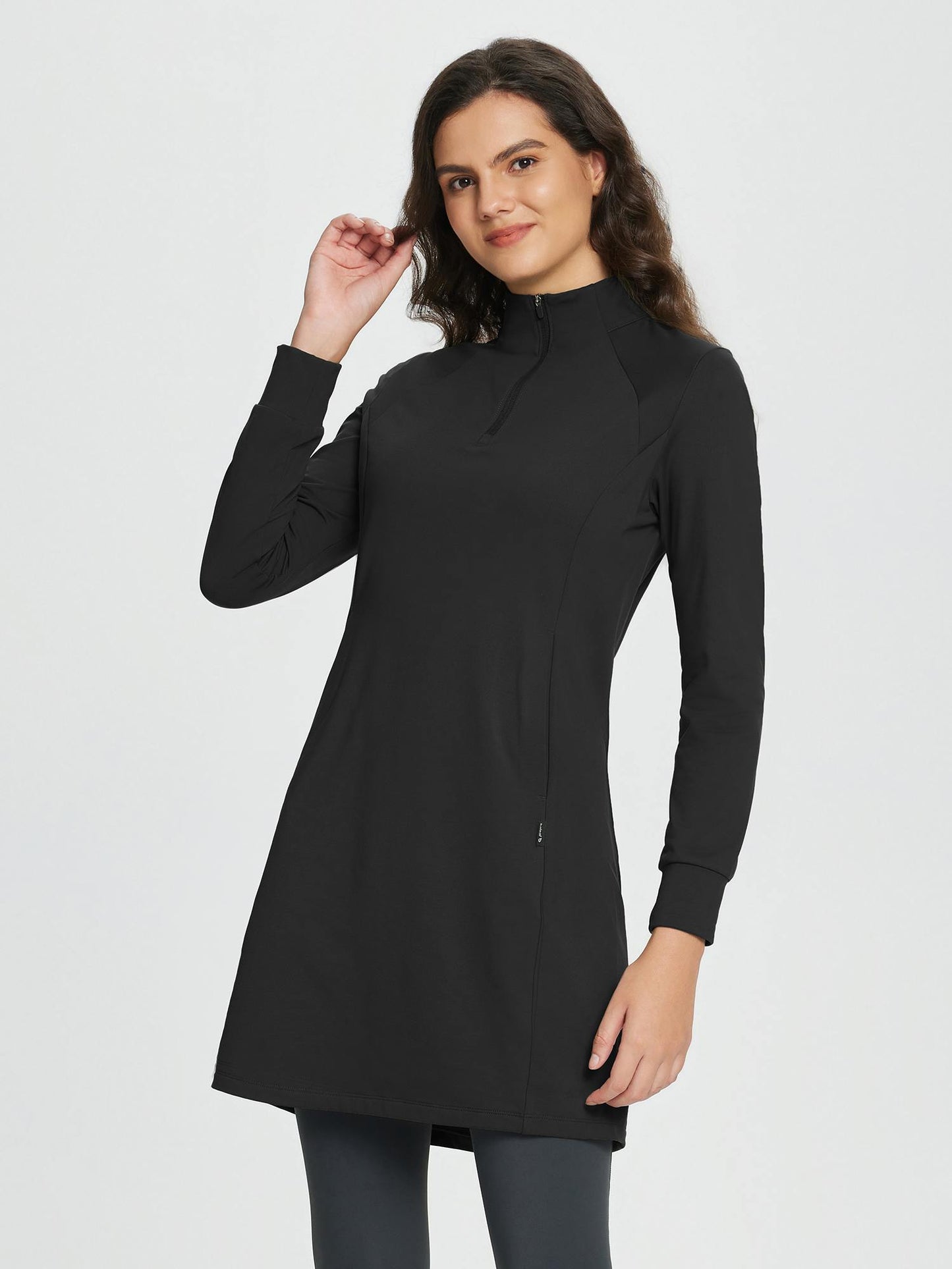 Women's winter dress with zipper stand-up collar, side pockets, and slitted hem