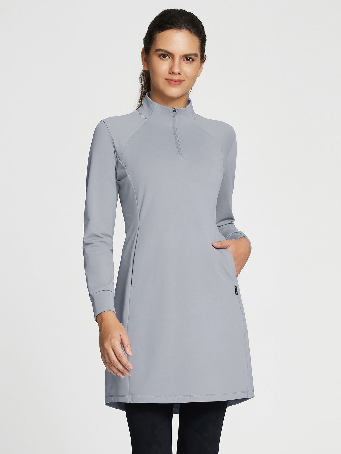 Women's winter dress with zipper stand-up collar, side pockets, and slitted hem