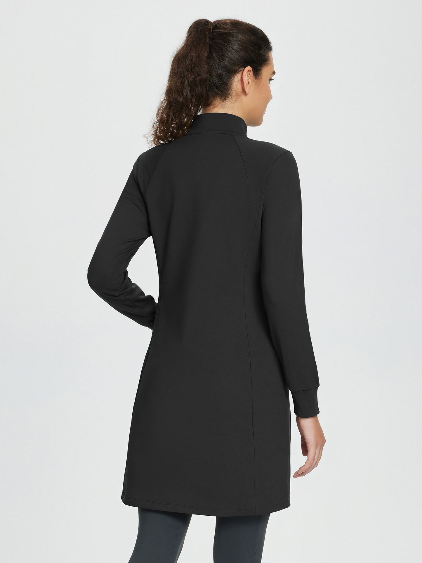 Women's winter dress with zipper stand-up collar, side pockets, and slitted hem