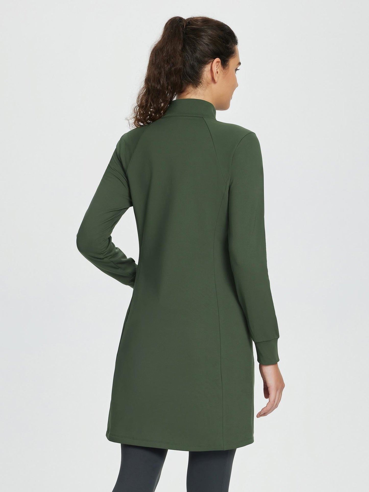 Women's winter dress with zipper stand-up collar, side pockets, and slitted hem