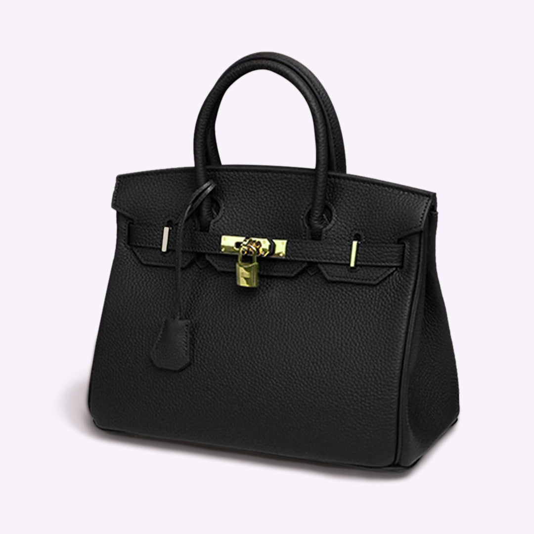 Luxuriöse schwarze Lederhandtasche mit goldener Hardware und Schloss, elegantes Design, ideal für stilvolle Damenmode und Accessoires.