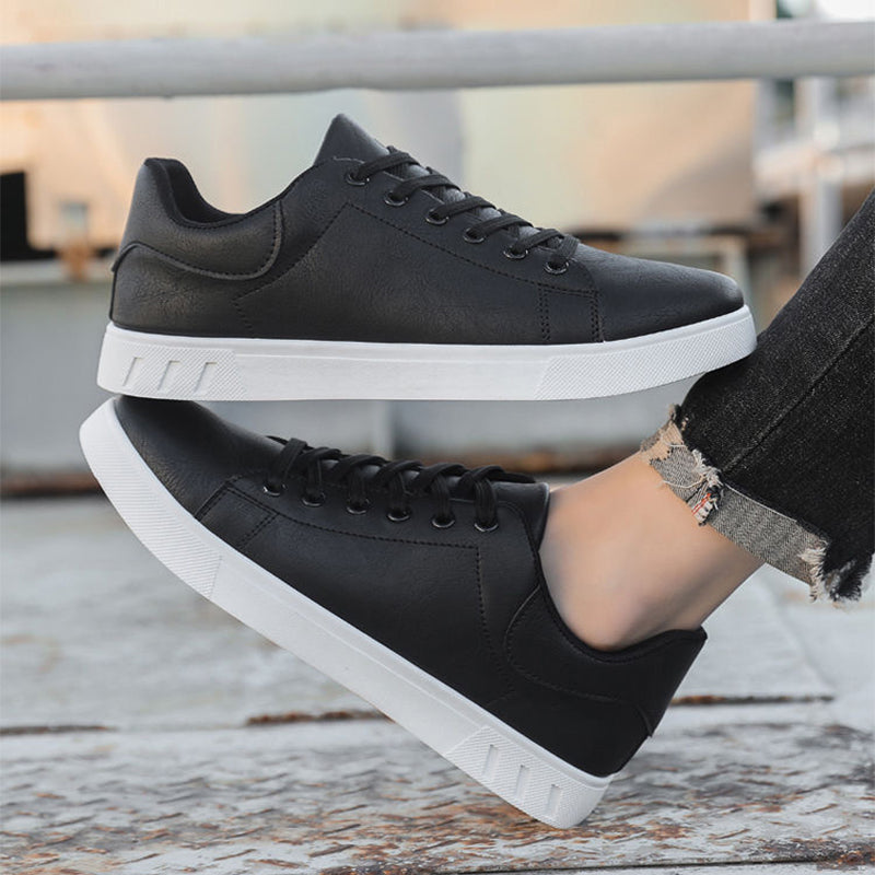 Men's lace-up shoes with low shaft, round toe area, and rubber sole