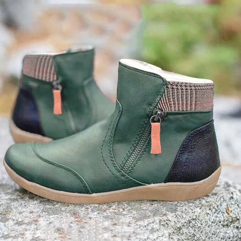Grüne Damenstiefeletten mit Reißverschluss, rutschfester Sohle und kariertem Futter. Bequeme, modische Herbst- und Winterstiefel für Damen.