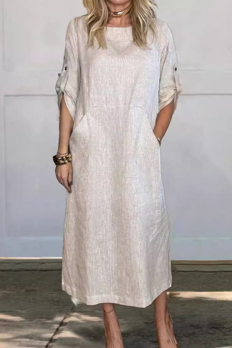Elegantes Damen-Leinenkleid in Beige, knielang, mit hochgekrempelten Ärmeln und Taschen. Perfekt für Sommermode und lässige Anlässe.