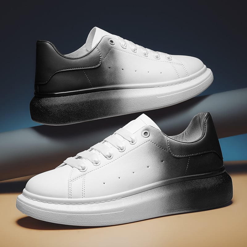 Weiße und schwarze Sneaker mit Farbverlauf, moderne Sportschuhe, stilvolles Design, bequeme Freizeitschuhe für Herren und Damen, Trend 2023.
