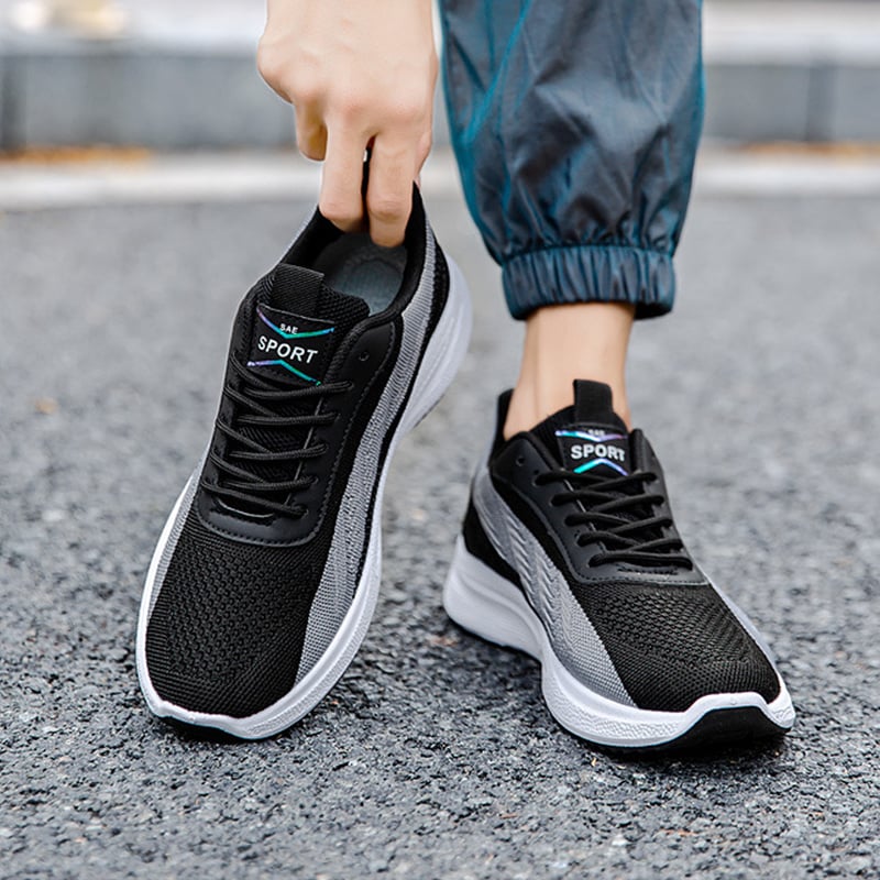 Men's lace-up sneakers with low-top design and rounded toe area