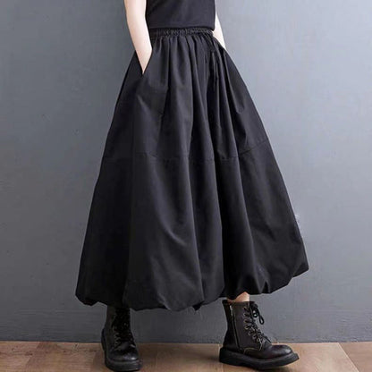 Women's solid color A-line skirt with layered design