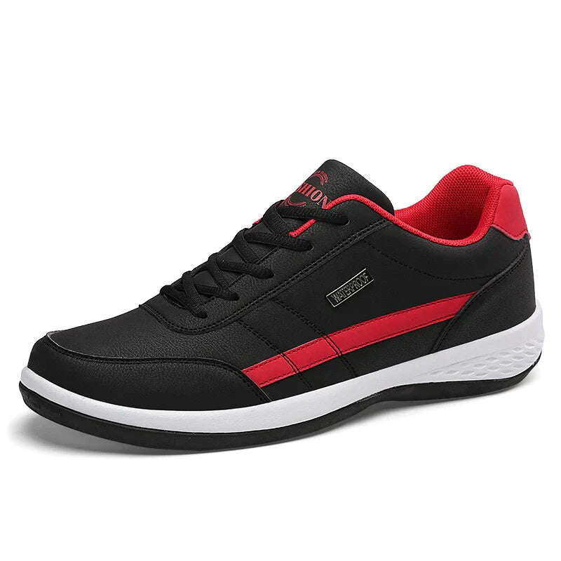 Schwarzer und roter Sneaker für Herren, sportliches Design, bequeme Passform, rutschfeste Sohle, ideal für Freizeit und Sport.