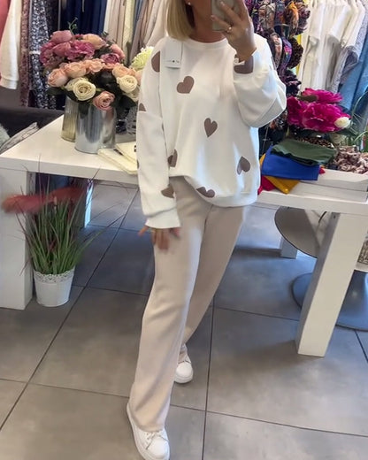 Women's knitted sweater with heart motif and relaxed fit