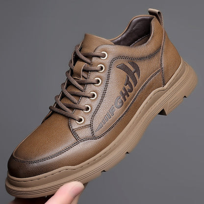 Men's work shoes with low shaft, rounded toe, and rubber sole