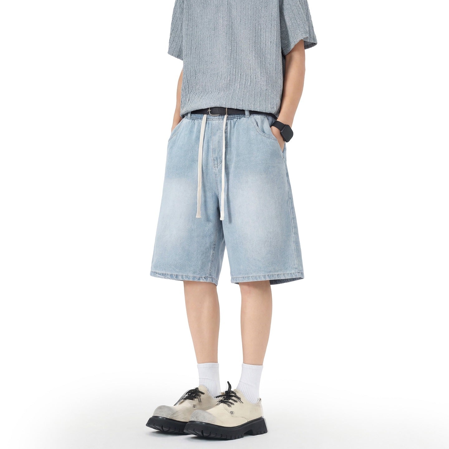 Men's denim shorts with stretch waistband, straight leg, and shortened fit