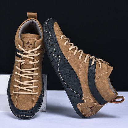 Braune Herren-Wanderschuhe mit schwarzem Akzent, robustem Design und Schnürung, ideal für Outdoor-Aktivitäten und Trekking.