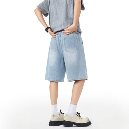 Men's denim shorts with stretch waistband, straight leg, and shortened fit