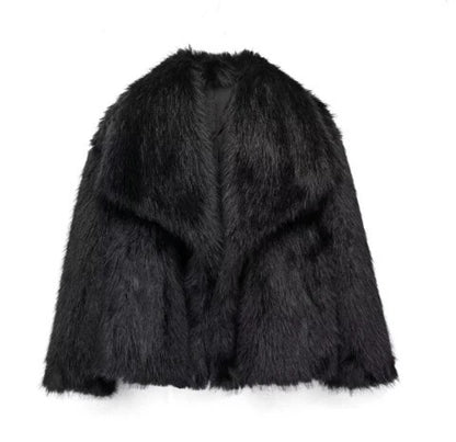 Schwarze Kunstpelzjacke, flauschig und stilvoll, ideal für Wintermode. Elegante Damenbekleidung, warm und modisch für kalte Tage.