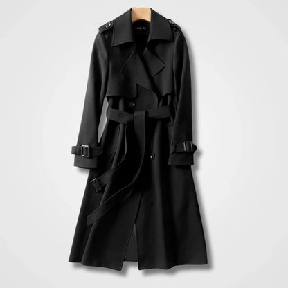 Schwarzer Trenchcoat aus Baumwolle, klassisches Design mit Gürtel und Knöpfen, ideal für Herbstmode und elegante Outfits.
