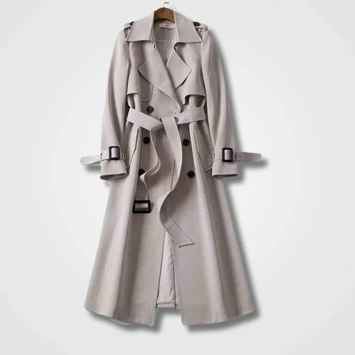 Eleganter beiger Trenchcoat mit Gürtel und Knöpfen, klassisches Design, ideal für Herbstmode, stilvoller Mantel für Damen.