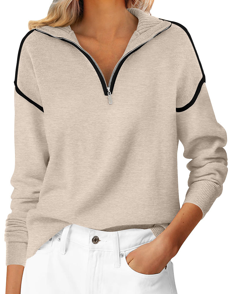 Detailansicht des Reverskragens und Reissverschlusses am Sweatshirt