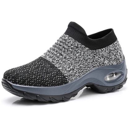 Schwarzer und grauer Damen-Sneaker mit rutschfester Sohle, atmungsaktivem Strickmaterial und gepolsterter Ferse für optimalen Komfort.