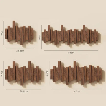 Vier moderne, geometrische Wandregale aus Holz in verschiedenen Größen, ideal für stilvolle Wohnraumdekoration. Maße: 22,8cm, 28,8cm, 41cm, 53cm.
