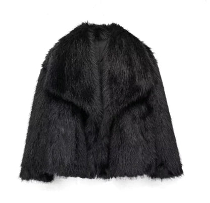 Schwarze Kunstpelzjacke, flauschig und stilvoll, ideal für Wintermode. Elegante Damenbekleidung, warm und modisch für kalte Tage.