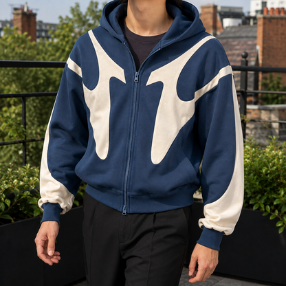 Detailaufnahme der Kontrastpartien und des Reissverschlusses am Hoodie