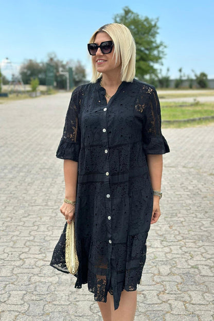 Damenkleid mit Dreiviertelarm und Knopfleiste in A-Linienform