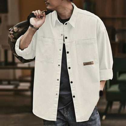 Men's shirt with button placket, long sleeves, front pockets