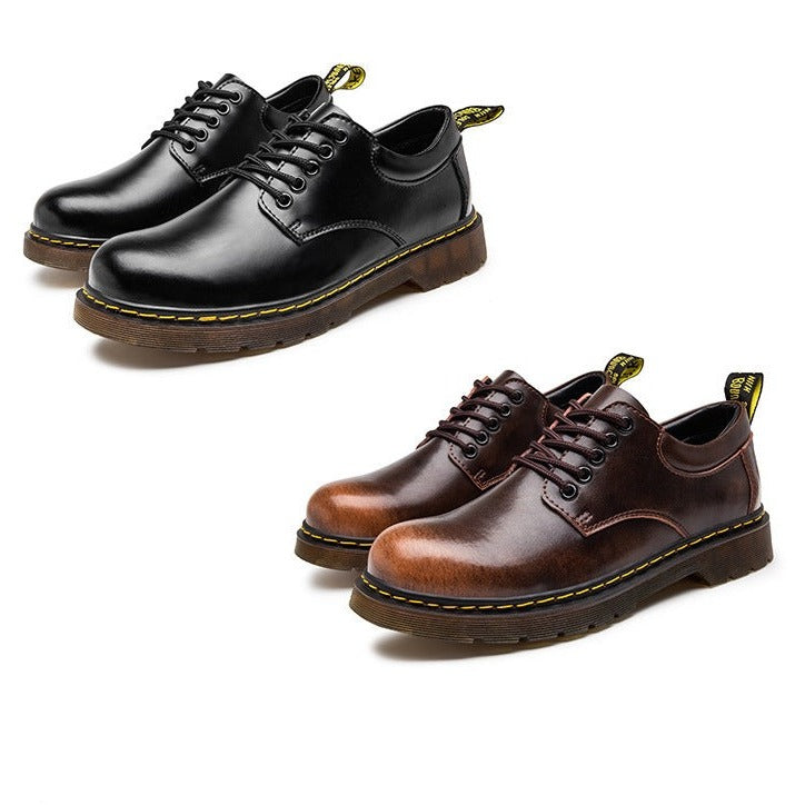 Schwarze und braune Leder-Herrenschuhe mit gelber Naht, robustem Design und rutschfester Sohle. Ideal für stilvolle und bequeme Alltagsmode.