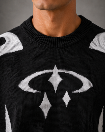 Seitenansicht des Herren-Grafikstrickpullovers mit lockerem Schnitt