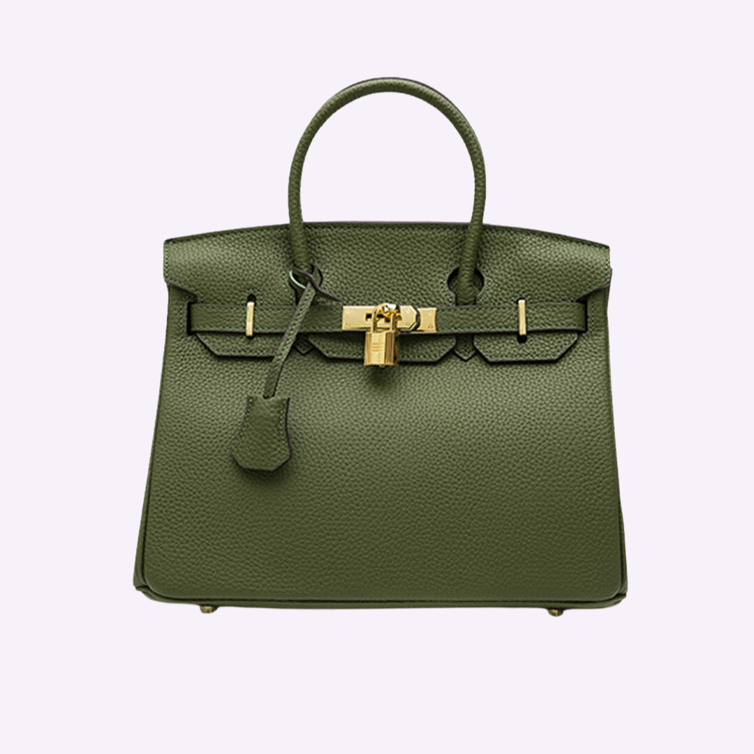 Grüne Designer-Handtasche aus Leder mit goldener Hardware und Schloss, elegantes Accessoire, luxuriöses Mode-Statement, stilvoll und zeitlos.
