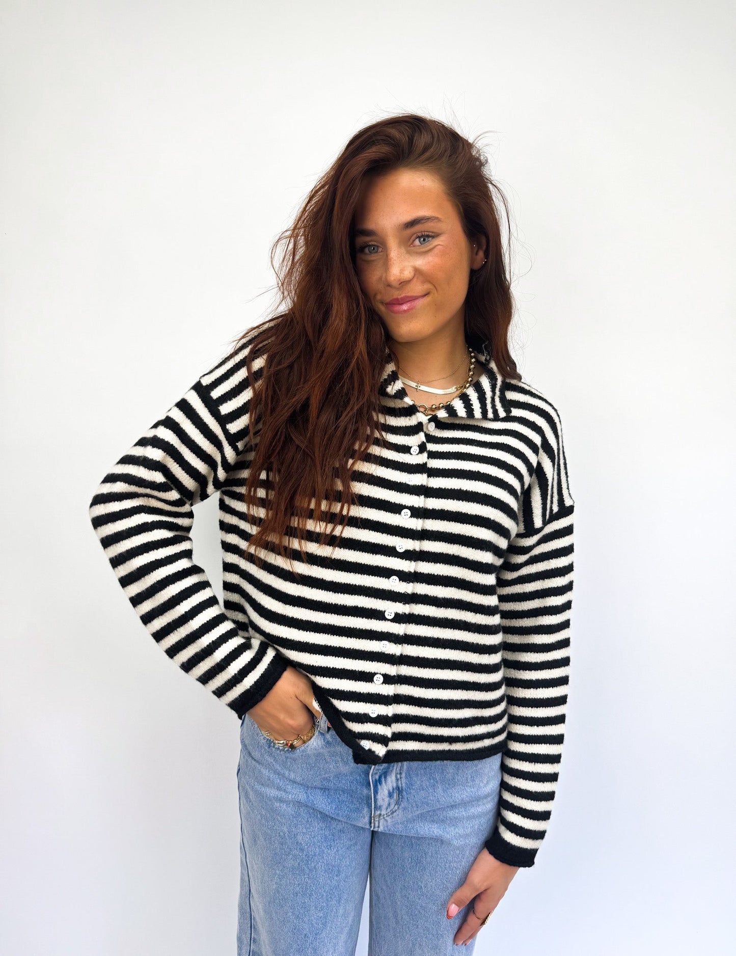 Women's knitted cardigan white with black stripes and button closure