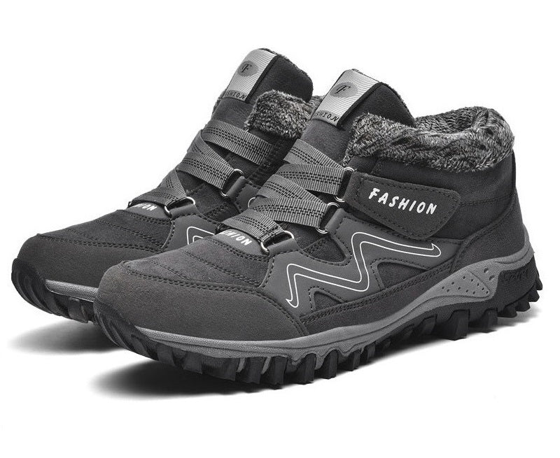 Graue Herren-Wanderschuhe mit Klettverschluss, rutschfester Sohle und warmem Futter. Ideal für Outdoor-Aktivitäten im Winter.