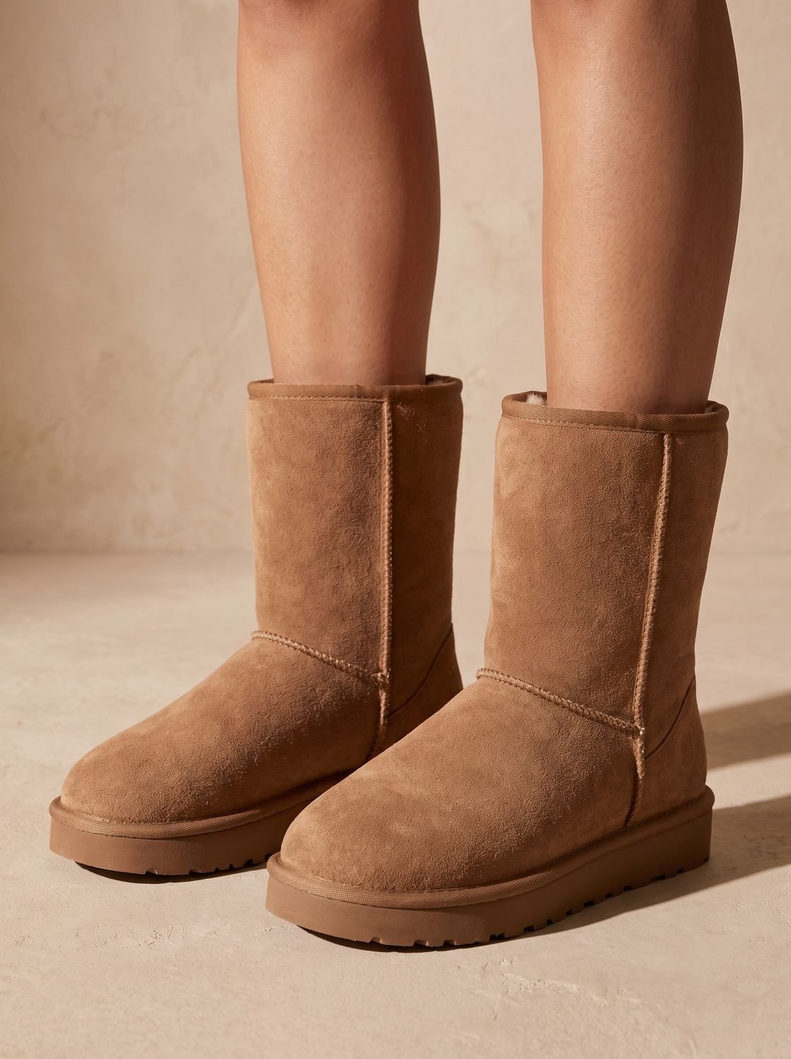 Wadenhohe Damen-Winterstiefel aus Kunstwildleder mit weichem Teddyfutter